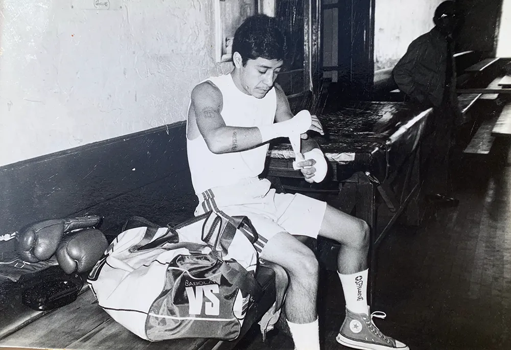 Carlos Manzano Jr. in the boxing locker room before a match