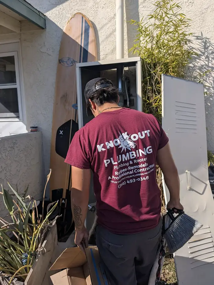 Licensed plumber on exterior service call in South Bay