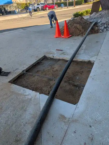 Trenchless sewer line replacement, cast iron to polyethylene pipe, Torrance CA
